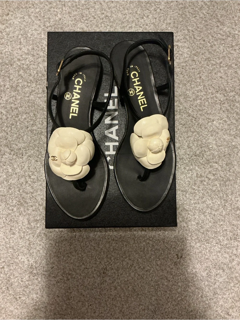 CHANEL Black Thong Sandals with Cream Camellia Detail